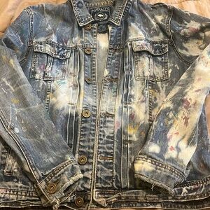 painted/ bleached Jean jacket w/ Tommy from rug rats on the back of the jacket